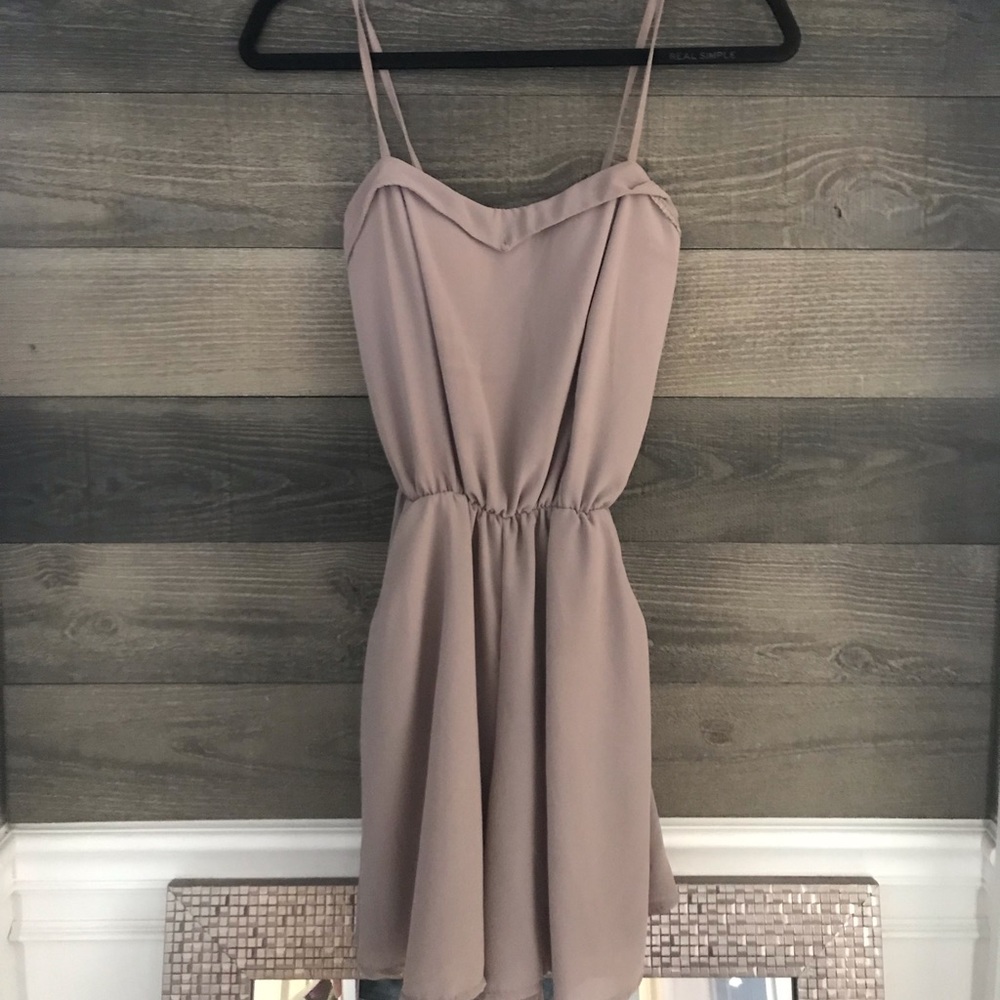 Taupe romper with pockets!